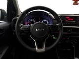 the interior of a car with a steering wheel and dashboard lights