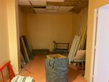 a room that is being remodeled with a bag in the middle of the room