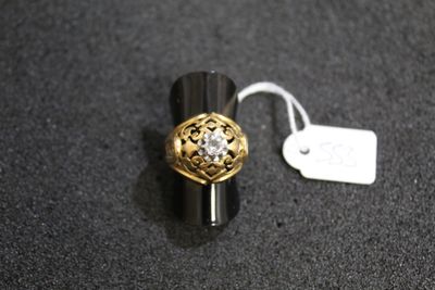 a close up of a ring with a tag attached to it