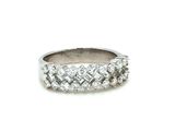 a close up of a diamond ring on a white background