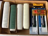 a cardboard box filled with different types of electronic devices