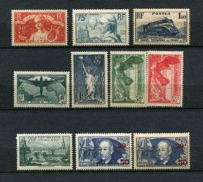 une collection de timbres de différents pays sur fond noir