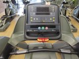 a close up of a tread on a machine in a gym