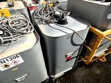 a lot of electrical equipment that is sitting on the ground