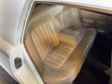 a seat in the back of a car that is empty