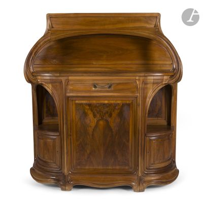 an antique walnut desk with two shelves and a drawer