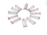 un cercle formé de tubes de verre sur une surface blanche