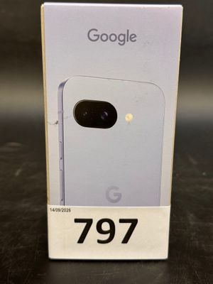 a close up of a box with a phone in it on a table