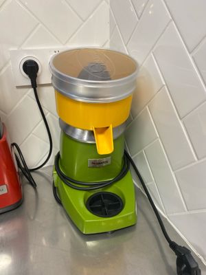 a blender and a blender sitting on a kitchen counter