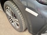 a close up of a car ' s bumper with a sticker on it