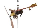 a small model of a plane with a propeller on a stand