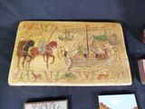 a wooden box with a picture of a boat on it