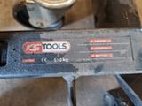 a close up of a tool that is sitting on a table