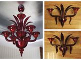 three pictures of a red chandelier hanging from a ceiling