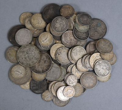 a lot of coins that are on the table