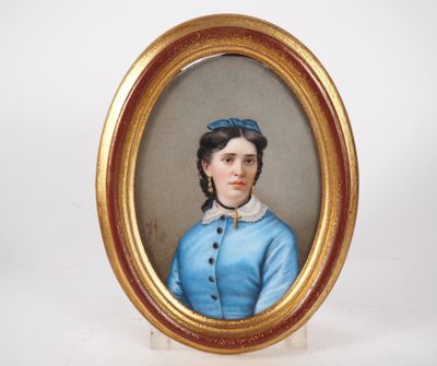 portrait of a woman in a blue dress in a gold frame