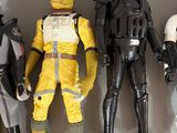 five star wars action figures are lined up in a row