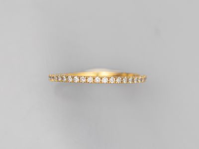 a yellow gold diamond eternity ring