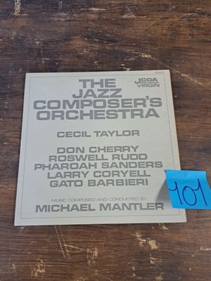 an image of a piece of paper on a table with a blue sticker