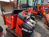 a lot of small machines that are parked in the parking lot