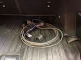 a hose in the trunk of a truck with a hose attached to it