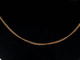 a close up of a necklace on a mannequin neck