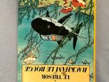 an old children ' s book with a picture of a fish on it