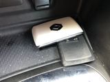 a cell phone that is sitting in the center of a car
