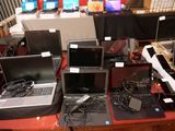 many laptops that are sitting on a table