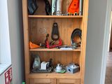 a cabinet with tools on top of it in a room
