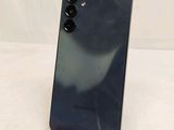 the back of a black phone with a camera attached to it