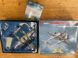 a box with a model of a fighter plane on it