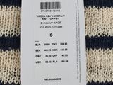 a close up of a sweater with a price tag on it