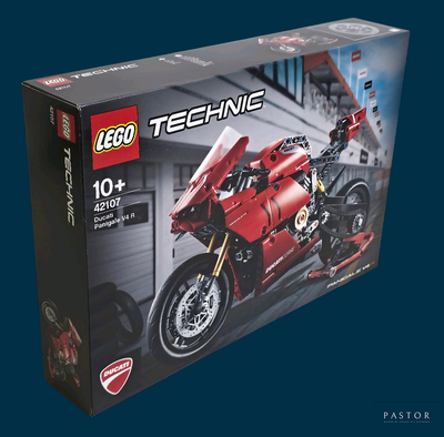 une boîte de Lego Technic contenant une moto rouge