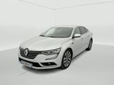 a white car in a white room with a white floor