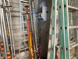 many ladders that are lined up in a room