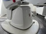 a machine that is sitting on the floor in the room