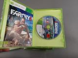 the xbox game far cry 3 is being held up in a green case