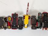 a lot of toy cars that are lined up on the wall