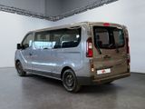 a silver van that is parked in a room