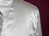 a close up of a white shirt on a mannequin dummy