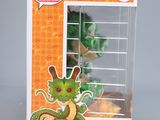 funko pop vinyl figure of a green dragon in a box