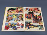 un livre ouvert sur lequel figurent des personnages de dessins animés