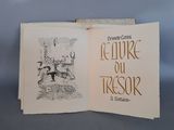 un livre ouvert avec l'image d'un chat dessus