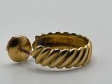 an image of a gold ring on a white background