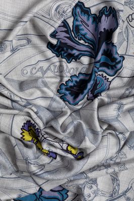 a close up of a fabric with a butterfly design on it