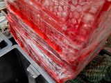 many plastic containers stacked on top of each other