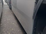 a truck that is parked on the side of the road