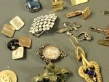 many different types of jewelry on the table