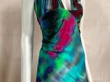 a mannequin wearing a colorful dress on a mannequin mannequin mannequin mannequin mannequin mannequin mannequin mann